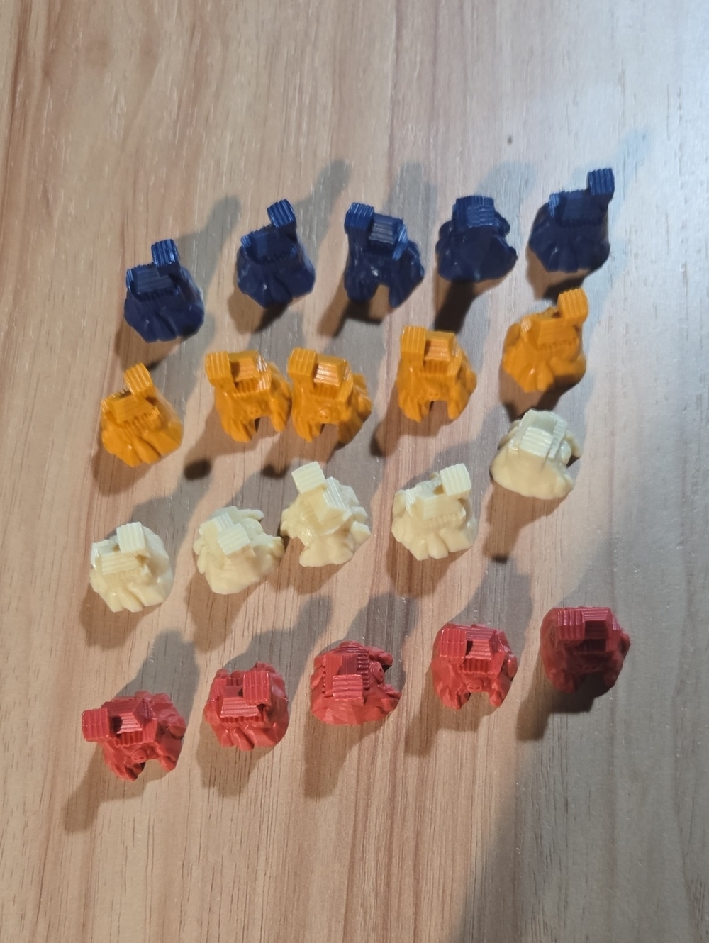 Source Unknown Multi-Color Small Game Pieces Set - Blue, Yellow, Cream, Red Tiki